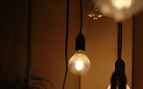 Representative photo: Warm clear light bulbs glowing. Not the exact product; the deal link goes to the actual product.